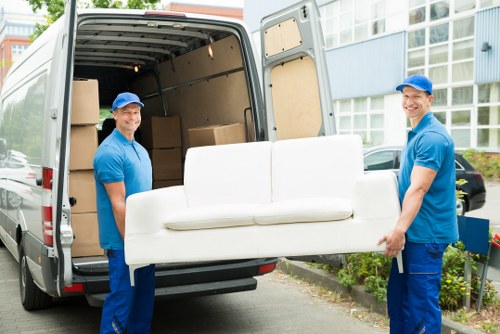 Customer moving boxes safely inside a storage facility