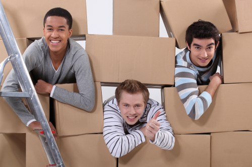 Residents loading items into a mobile storage unit