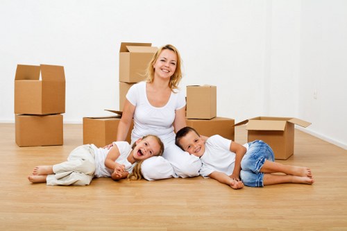 Removal crew loading furniture during house removals in Beddington